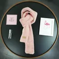 Detail of pink knitted scarf with soft faux fur texture and Beloved logo tag - Pink / 162cm