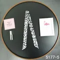 Detail of black and white leopard print skinny scarf used for handbag handle decoration - Black White Gray Leopard (S177-5)