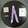 Detail of pink fashion twilly scarf with vintage belt patterns and chain prints - Pink