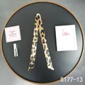 Macro view of leopard print satin scarf handle wrap for handbags with smooth silk texture - Brown Black Leopard (S177-13)