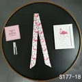 Detailed view of pink flamingo print twilly silk scarf tied on a tray accessory - White Base Pink Flamingo (S177-18)