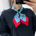 Sky blue floral silk scarf with red border styled as a necktie on a black shirt - Sky Blue Red Base