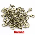 Macro detail of bronze zinc alloy lobster clasps for DIY jewelry making and bag chains - 10x5mm (50 Pieces/10g) / Antique Bronze