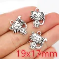 Detailed close-up of retro silver 19x17mm cat charms for DIY jewelry making - Antique Silver Sitting Cat (P5-29)