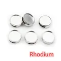 Macro shot of 6 rhodium plated alloy slider beads with flat holes for jewelry making - 12mm / White K/Silver