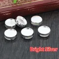 Set of six 12mm bright silver DIY jewelry base trays for pendant beads on wood surface - 12mm / Bright Silver Plated