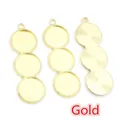 Three gold alloy DIY jewelry pendant trays with textured borders and radial patterns - Gold