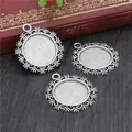 Three antique silver round alloy pendant trays with delicate lace edges on wood surface - Hollow Lace Round Tray (D2-07)