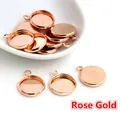 Basi tonde per ciondoli in oro rosa per gioielli fai-da-te in una ciotola bianca - Oro Rosa