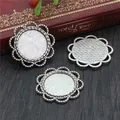 Antique silver lace alloy pendant trays for DIY jewelry making on wooden background - Antique Silver Lace Round Base (K1-17)