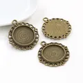 Three vintage bronze 20mm round lace pendant trays for DIY jewelry making on white background - Lace Border Round Tray (N5-12) / Antique Bronze