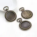 Supports pendentifs vintage 20mm en alliage bronze avec motifs floraux baroques - Bronze Antique