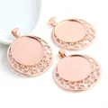 Detailed view of three rose gold round pendant trays with cutout star pattern frames - Rose Gold Star Border Style (A6-38) / Rose Gold