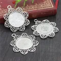 Close-up of three 25mm sunflower alloy pendant trays for DIY jewelry making - Antique Silver Sunflower Style (A4-05)