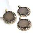 Three bronze alloy 25mm bezel settings with hollow star patterns for DIY jewelry pendants - Retro Hollow Star Style (A5-12) / Antique Bronze