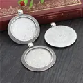 Three 25mm vintage silver alloy pendant trays for DIY jewelry on a retro wooden table - Woven Texture Round Style (A3-03)