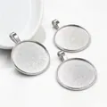 Detailed view of three 25mm silver alloy pendant trays for DIY jewelry making crafts - Bright Silver Style (A4-39)