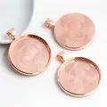 Close-up of three 30mm round rose gold bezel trays with internal grid texture - Bright Rose Gold Radial Grid Style (B7-12)