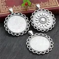Detailed view of vintage silver alloy pendant trays and sunflower embossing on wood - Silver Sunflower Lace Style (B5-07)