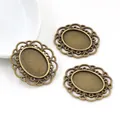 Three antique bronze oval cabochon settings for DIY jewelry making on white background - Bronze Filigree Oval Bezel Base (D4-06)