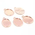 Five rose gold oval alloy pendant bases with internal 13x18mm tray and radial texture - Rose Gold Sunray Texture Pendant Base (D4-38)