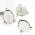 Three antique silver alloy jewelry connector bases for DIY pendants on white background - Retro Silver 3-Loop Bezel Set