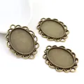 Three vintage 18x25mm oval alloy pendant bases with ornate hollow lace edges - Antique Bronze Oval Filigree Base