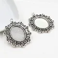 Lot de deux supports ovales argent antique avec bords filigranés pour bijoux DIY - Motif Volute Ajouré Argent Antique (C1-38)