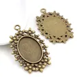 Supports de pendentif ovales en bronze antique avec bordure fleurie pour bijoux DIY - Bronze Floral Bezel Tray (C3-46)