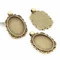 Support pendentif ovale 18x25mm bronze antique avec bordure dentelle et dos texturé - Antique Bronze Lace Bezel (C3-54)