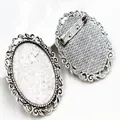 Macro view of vintage silver alloy 30x40mm oval brooch base and pin back for DIY jewelry - Vintage Silver Hollow Scroll Style (B4-16)