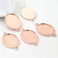 Macro view of 18x25mm rose gold oval alloy pendant bases with dual hanging loops for DIY - Rose Gold Oval Dual Loop Tray