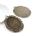 Vintage bronze oval alloy pendant tray set with ornate embossed scroll edges for DIY jewelry - Antique Bronze Double-sided Embossed Oval Style (B1-05)