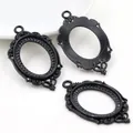Vintage 18x25mm black oval alloy pendant bases with intricate filigree for DIY jewelry - Black