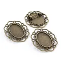 Detailed macro view of vintage bronze alloy brooch base with filigree lace edge - Antique Bronze Filigree Style (C3-10)