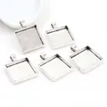 Close-up of five square alloy pendant trays in antique silver for DIY jewelry making - Vintage Silver (A7-03)