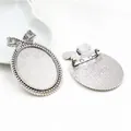 Antique silver alloy bow brooch base with oval setting shown in front and back views - Antique Silver Bow Decorative Style (B4-18)