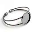 Macro detail of gunmetal plating open cuff bracelet base with 20/25mm round bezel tray - 20mm / Gunmetal