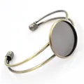 Detail of vintage bronze cuff bracelet base with double-wire design and round bezel setting - 20mm / Brushed Antique Bronze