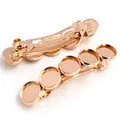 Close-up van gouden haarspelden met vijf 12mm ronde fittingen voor doe-het-zelf sieraden - KC Goud