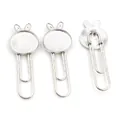 Macro detail of silver bunny paperclips with DIY gem trays for jewelry making and bookmarks - Rabbit / Silver
