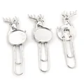 Detailed view of silver deer head paper clips with DIY jewelry bezel trays in a set of three - Deer / Silver