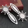 Retro silver helm shaped metal bookmarks with 18mm round base on a red vintage book - Antique Silver Rudder Style (H1-03)