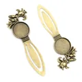 Detailed view of bronze alloy bookmark bases with vintage floral embossed patterns - Floral Berry Relief Style (I1-42)