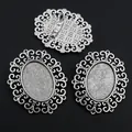 Macro view of vintage silver alloy brooch tray base with ornate hollow scroll patterns - Antique Silver Scroll Hollow Style (V4-02)