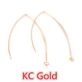 Close-up of elegant V-shape KC gold ear hooks with loop for DIY jewelry making - 28mm / KC Gold