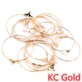 Macro shot of KC gold circular metal hoops for jewelry making and DIY earrings - Size S / KC Gold