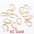 Macro shot of KC Gold plated DIY earring hooks with unique textured fishhook design - KC Gold