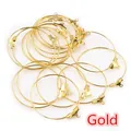 Close-up of gold-plated metal wine glass rings and earring hoops with DIY loop fasteners - Size S / Gold