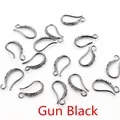 Detailed macro view of gun black DIY earring hooks with micro-pave cubic zirconia inlay - Gunmetal